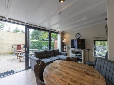 Bungalow Astounding bungalow with garden - Outdoor photo 19