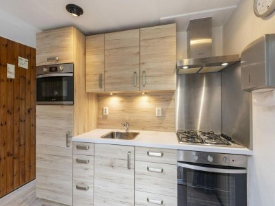 Bungalow Astounding bungalow with garden - Outdoor photo 32