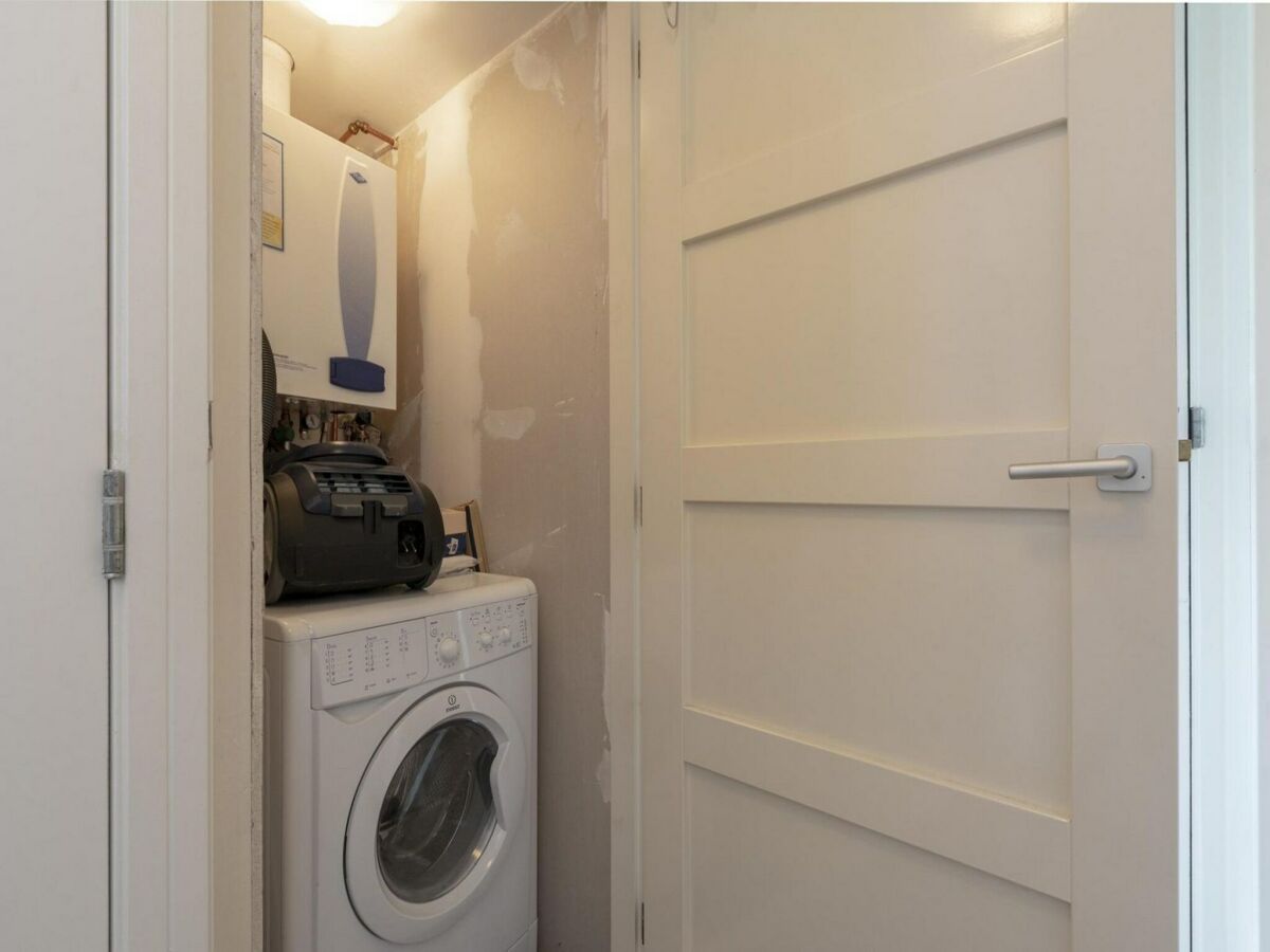 Holiday house Stylish bungalow at Duinland park with patio - Outdoor photo 5