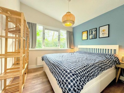 Holiday house Stylish bungalow at Duinland park with patio - Outdoor photo 10