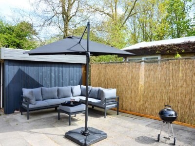 Holiday house Stylish bungalow at Duinland park with patio - Outdoor photo 13