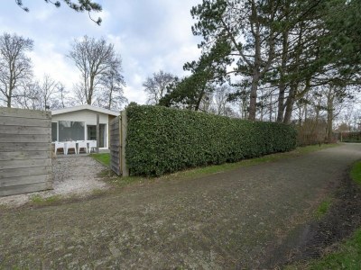 Holiday house Stylish bungalow at Duinland park with patio - Outdoor photo 15