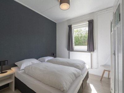 Holiday house Vibrant Holiday home with garden - Outdoor photo 9