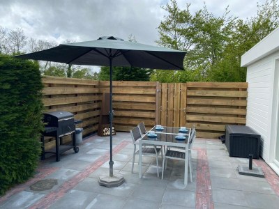 Bungalow Elegant bungalow with sauna and garden - Outdoor photo 9