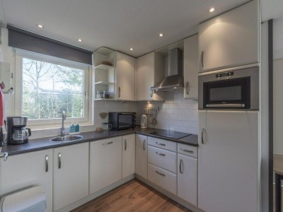 Bungalow Elegant bungalow with sauna and garden - Outdoor photo 19