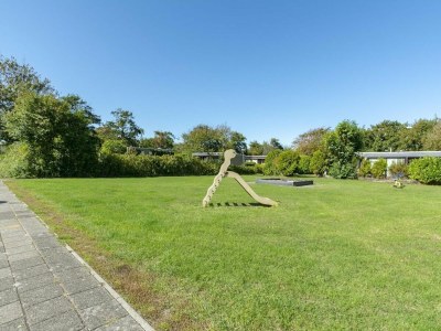 Bungalow Alluring seaside holiday home in Callantsoog - Outdoor photo 7