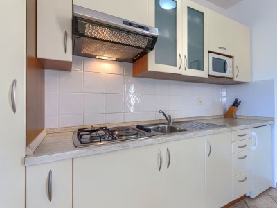 Apartment Nino with Shared Pool - One-Bedroom A1 with Balcony - Features photo 18