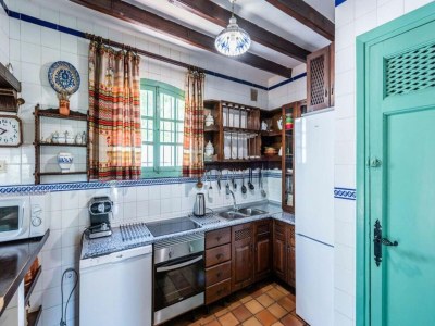 Holiday house Holiday home with pool and beach bar - Features photo 21