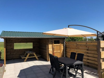 Holiday park Chalet in Wiringherlant am Meer für 4 Von Belvilla - Outdoor photo 7