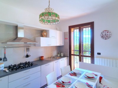 Holiday house House in Luino with Green Garden and City Views - Features photo 13