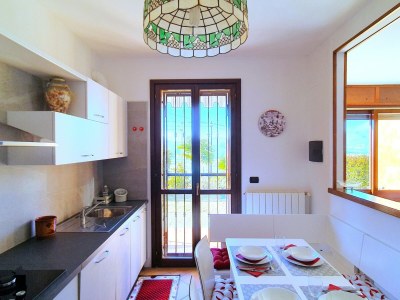 Holiday house House in Luino with Green Garden and City Views - Features photo 19