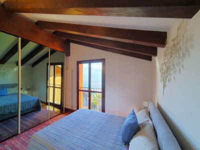 Holiday house House in Luino with Green Garden and City Views - Features photo 26