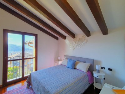 Holiday house House in Luino with Green Garden and City Views - Features photo 28