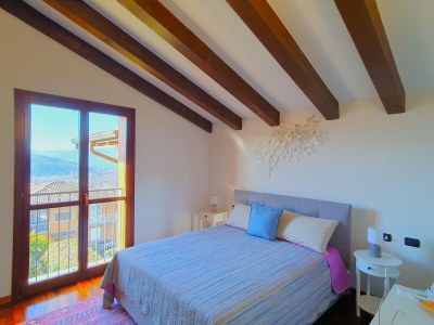 Holiday house House in Luino with Green Garden and City Views - Features photo 33