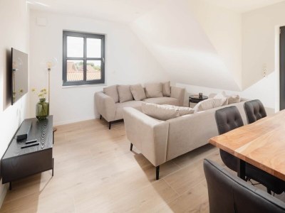 Holiday apartment Küsten Suite West | Seitliche Wasserlage - Features photo 5