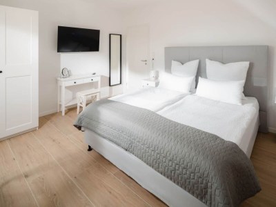 Holiday apartment Küsten Suite West | Seitliche Wasserlage - Features photo 7