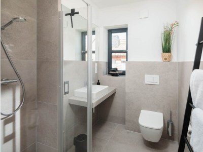 Holiday apartment Küsten Suite West | Seitliche Wasserlage - Features photo 13