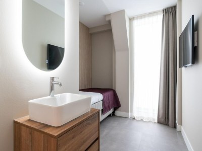 Holiday house Wohnung im Zeeheldenkwartier - Features photo 12