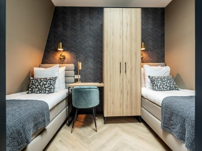 Apartment Family Apartment w/ Bunk Beds - Features photo 11