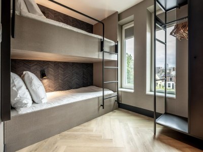 Apartment Family Apartment w/ Bunk Beds - Features photo 12