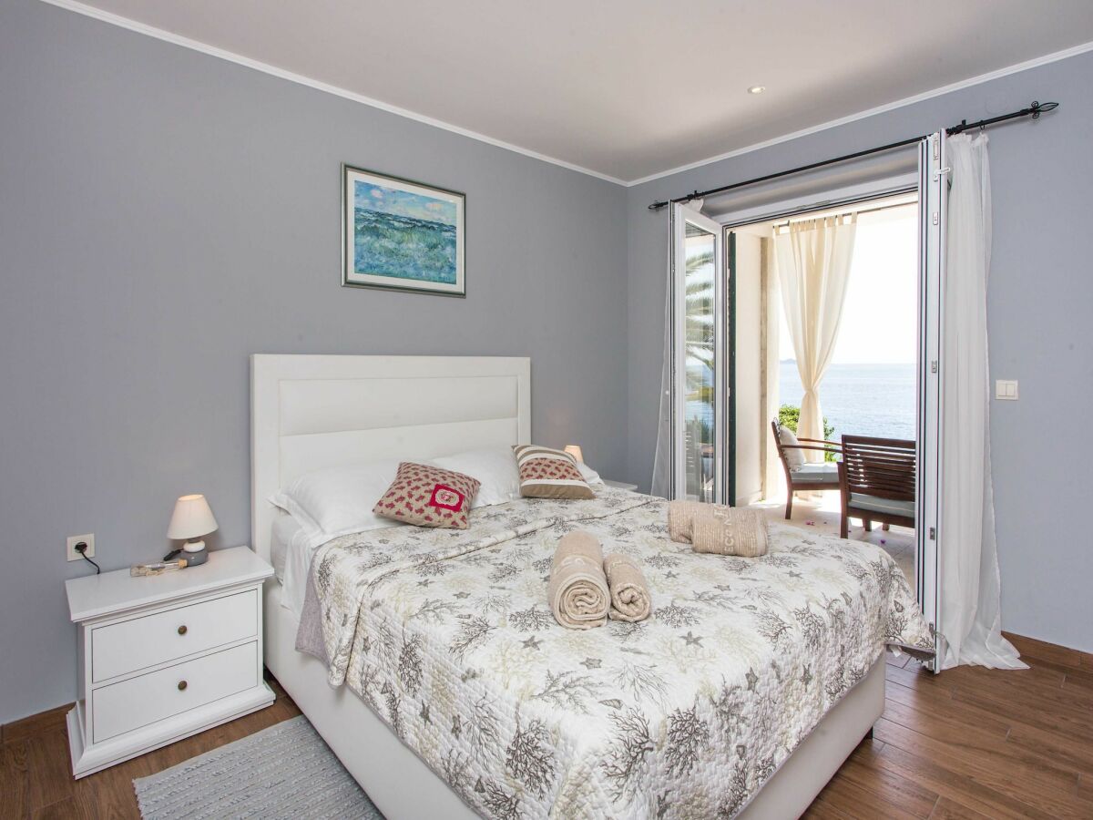 Apartment Villa Mirjana - One Bedroom Apartment with Terrace and Sea View (Palma) - Features photo 3