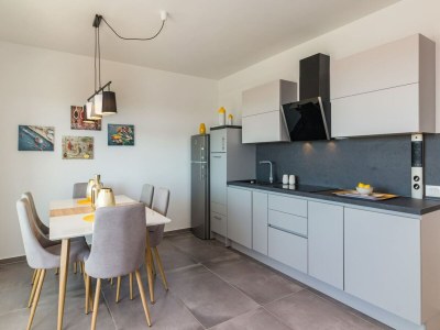 Apartment Möbliertes Penthouse mit Meerblick - Features photo 16