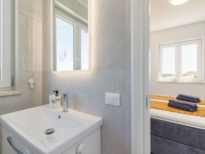 Apartment Möbliertes Penthouse mit Meerblick - Features photo 21