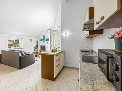 Apartment Familienfreundliches Apartment mit Meerblick - Features photo 6