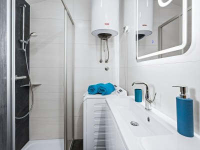 Apartment Familienfreundliches Apartment mit Meerblick - Features photo 7