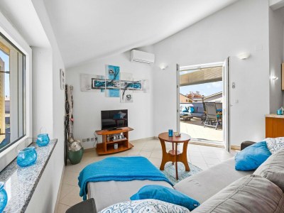 Apartment Familienfreundliches Apartment mit Meerblick - Features photo 9