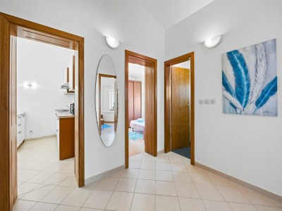 Apartment Familienfreundliches Apartment mit Meerblick - Features photo 11