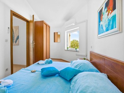 Apartment Familienfreundliches Apartment mit Meerblick - Features photo 16