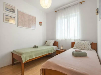 Apartment Apartment in Rakalj near Rock Beach - Features photo 12