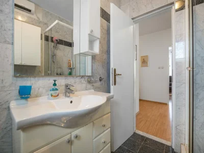 Apartment Apartment in Rakalj near Rock Beach - Features photo 13