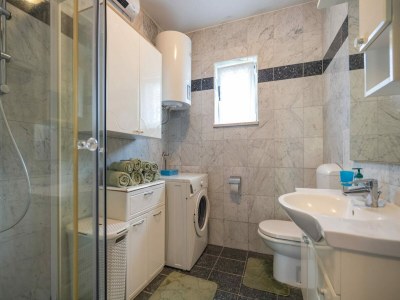 Apartment Apartment in Rakalj near Rock Beach - Features photo 20