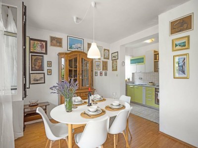 Apartment Apartment in Rakalj near Rock Beach - Features photo 22