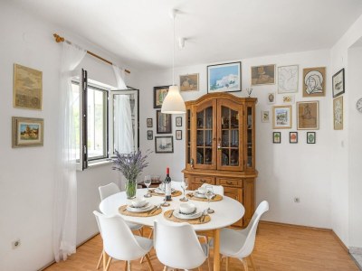 Apartment Apartment in Rakalj near Rock Beach - Features photo 24