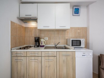 Apartment Apartment in Drenje with Sea View & Sauna - Features photo 9