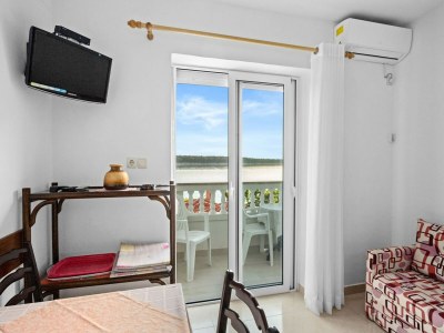 Apartment Wohnung Rab mit privatem Steg und Meerblick - Features photo 24