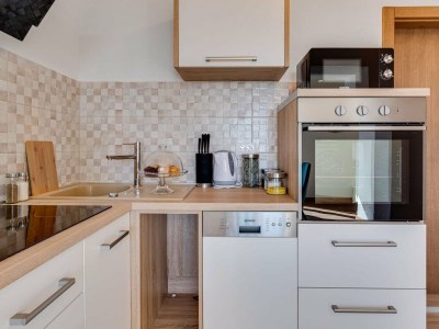 Apartment Tastefully designed apartment in Karlobag - Features photo 18