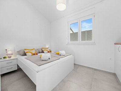 Apartment Attractive apartment in Peroj with terrace - Features photo 8