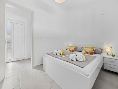 Apartment Attractive apartment in Peroj with terrace - Features photo 11