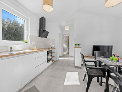 Apartment Attractive apartment in Peroj with terrace - Features photo 13