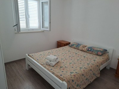 Holiday house Nane Garden house with heat pool - Features photo 2