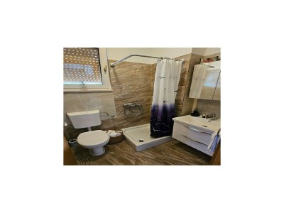 Holiday house Holiday Home Sunrise - Three Bedroom Holiday Home - Features photo 43