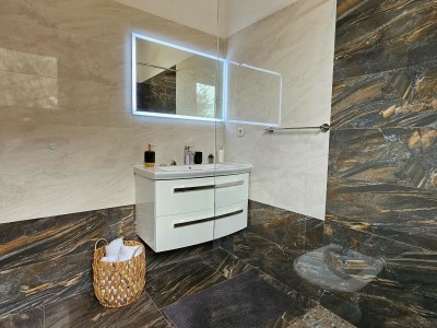 Holiday house Holiday Home Sunrise - Three Bedroom Holiday Home - Features photo 50