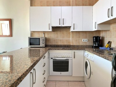 Apartment Strandwohnung in Nerja mit Pool - Features photo 11