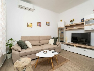 Apartment Apartment Family Tokić - One Bedroom Apartment with Terrace - Features photo 23