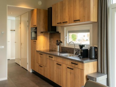 Holiday house Luxury holiday home surrounded by water & forest - Features photo 11