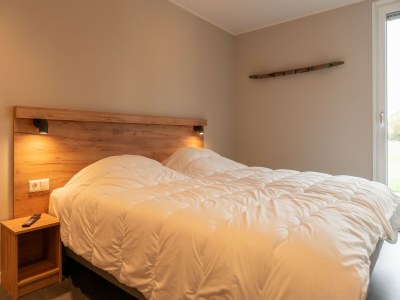 Holiday house Luxury holiday home surrounded by water & forest - Features photo 16